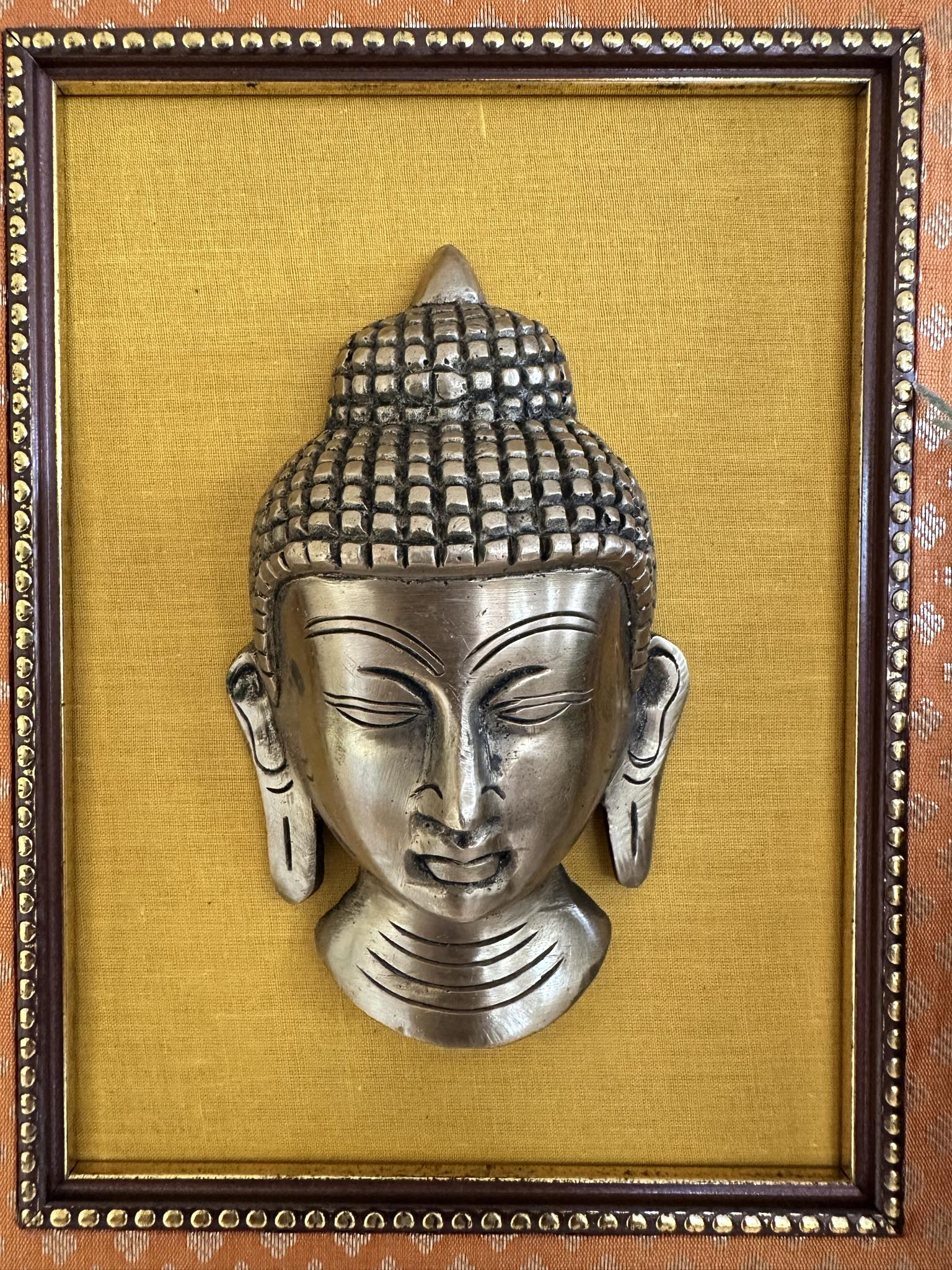 Handcrafted Buddha Face in Brass on Silk Frame with 3D Effect, BFD- 907