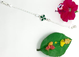 Silver Rakhi with Green Stone Studded Floral Design, SLD# 643